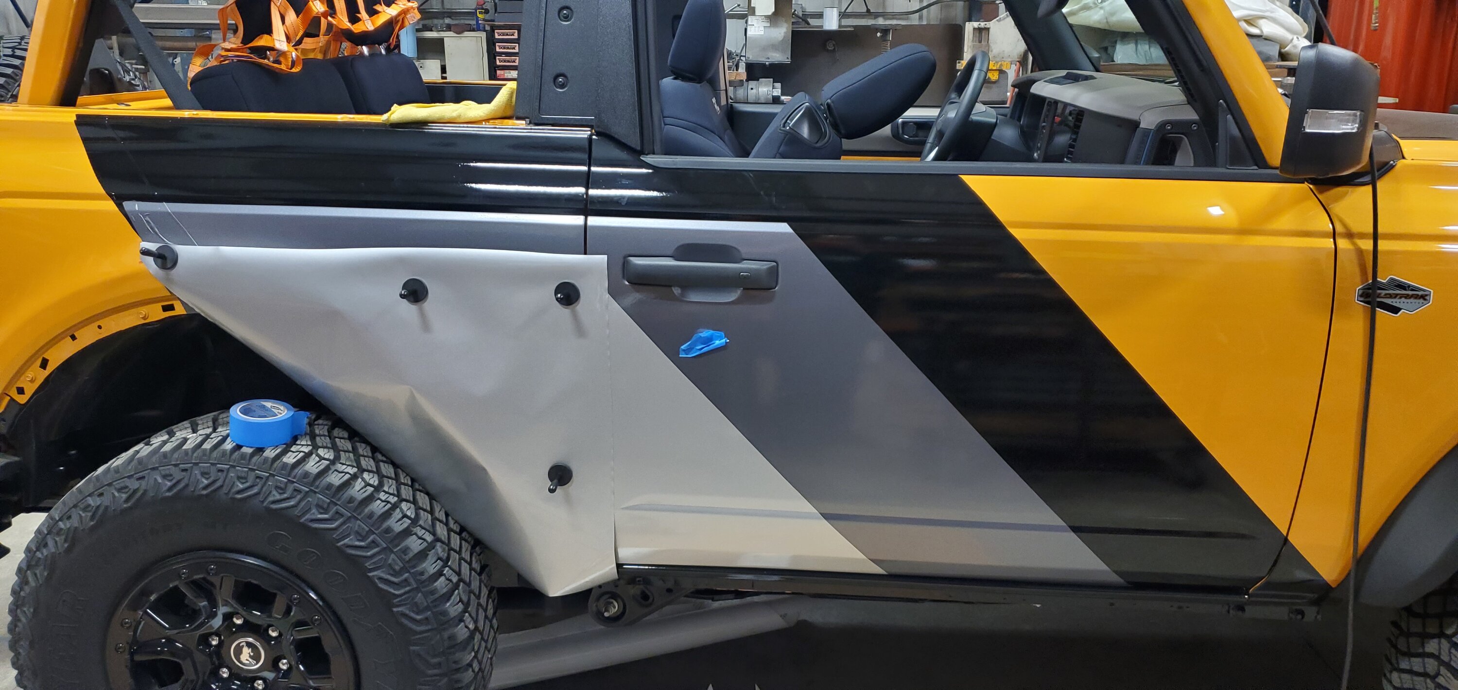 Ford Bronco Mud flaps are ugly, so I went another direction with vinyl wrap protection 1676047603757