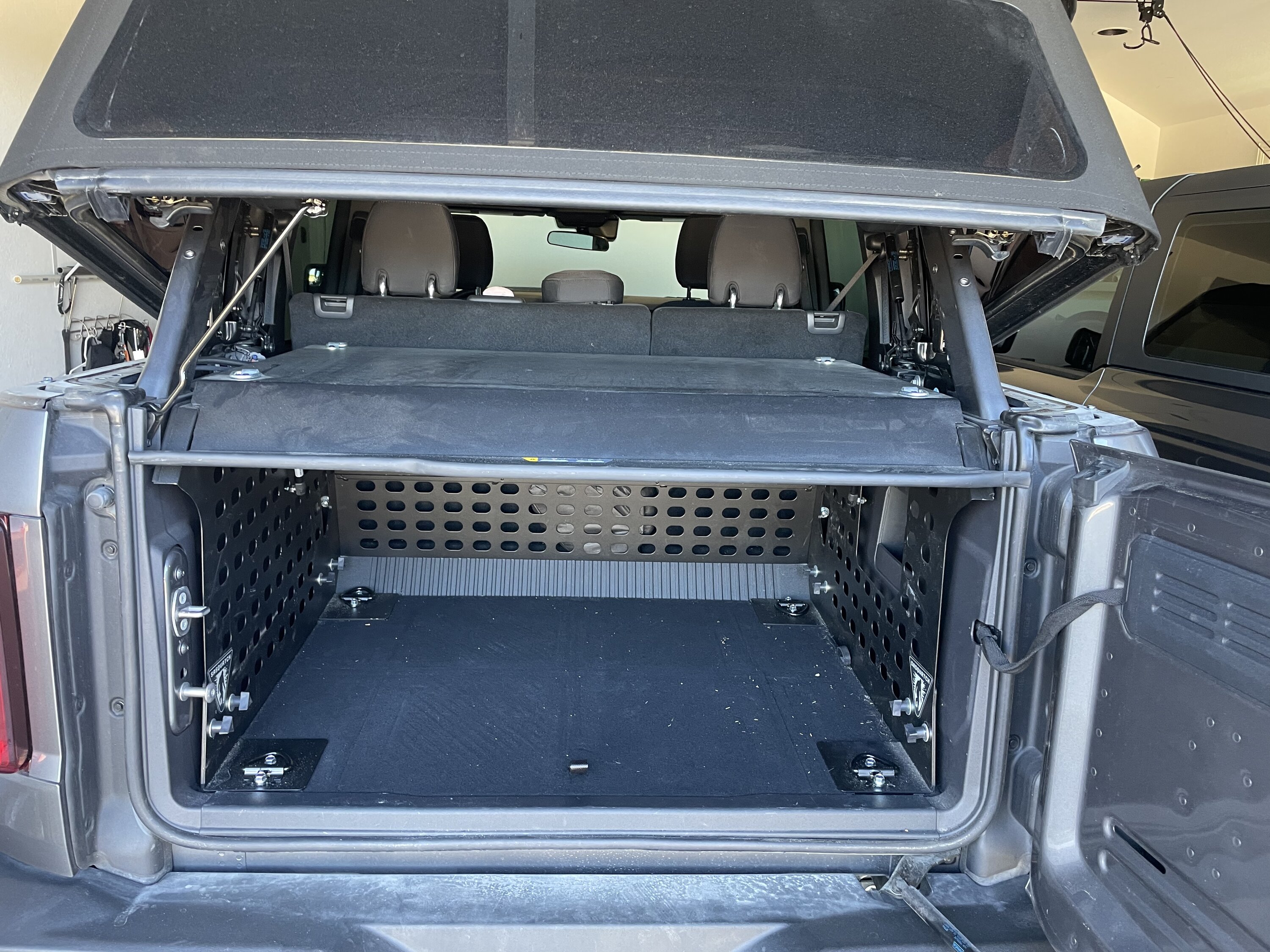 Ford Bronco Raised lid security enclosure B5F0ED72-84BF-44A5-B692-12D88F9989C0