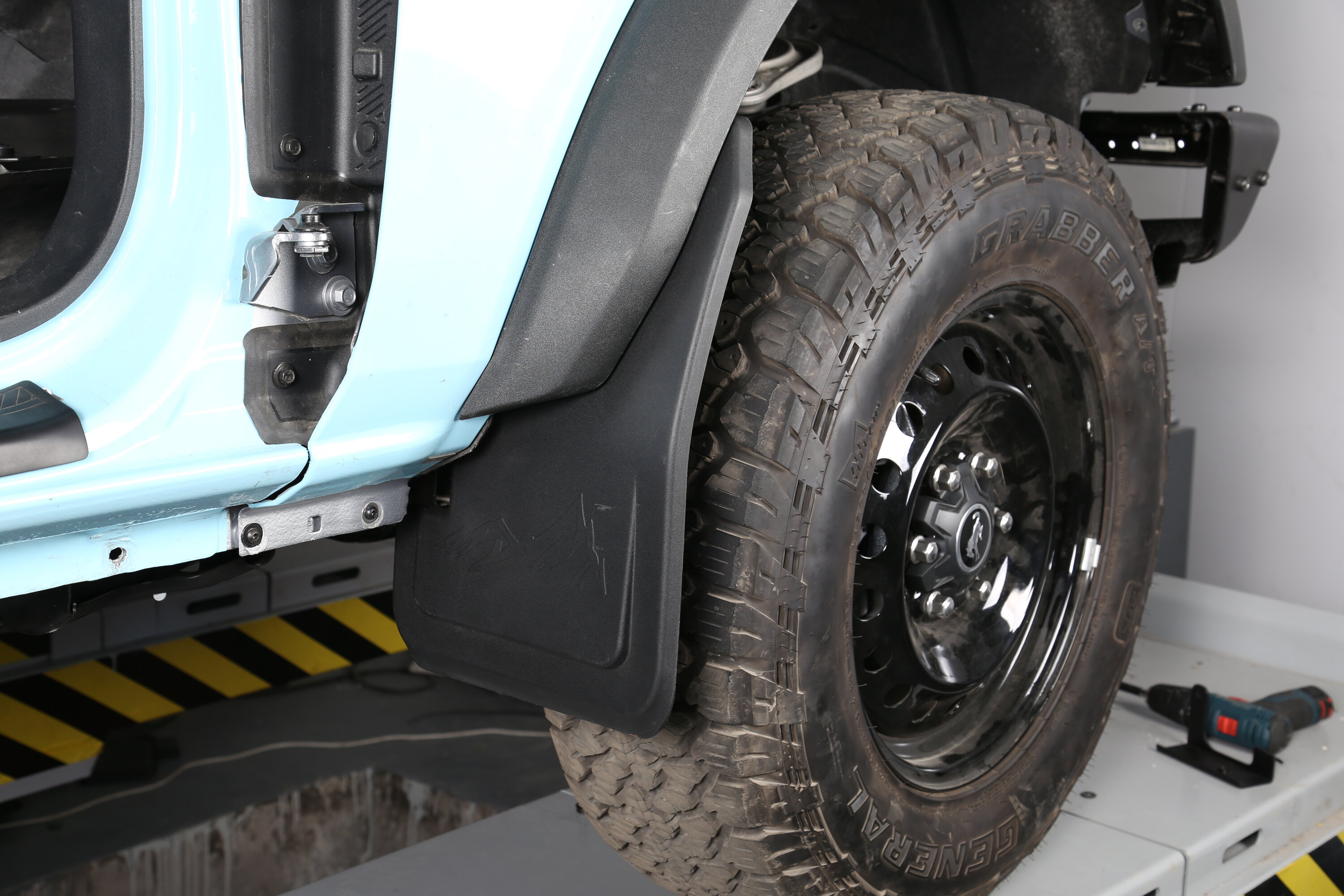Ford Bronco Mabett Mud Flaps Fits Sasquatch set that accommodates factory rock rails or tube steps IMG_1274.JPG