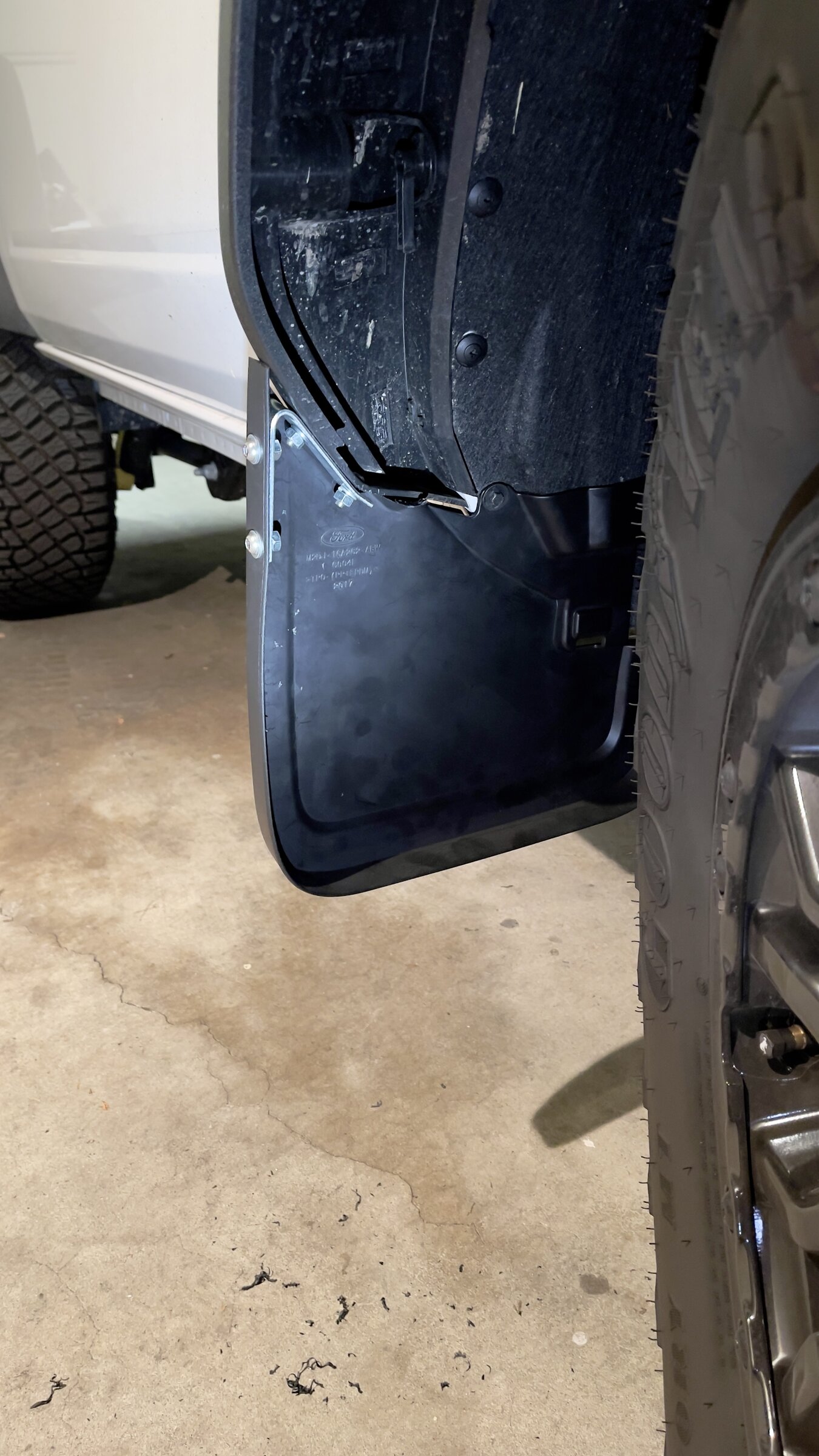 Ford Bronco Ford OEM Mud Flaps / Splash Guards trimmed to fit OBX Sasquatch with side steps JPEG image 5